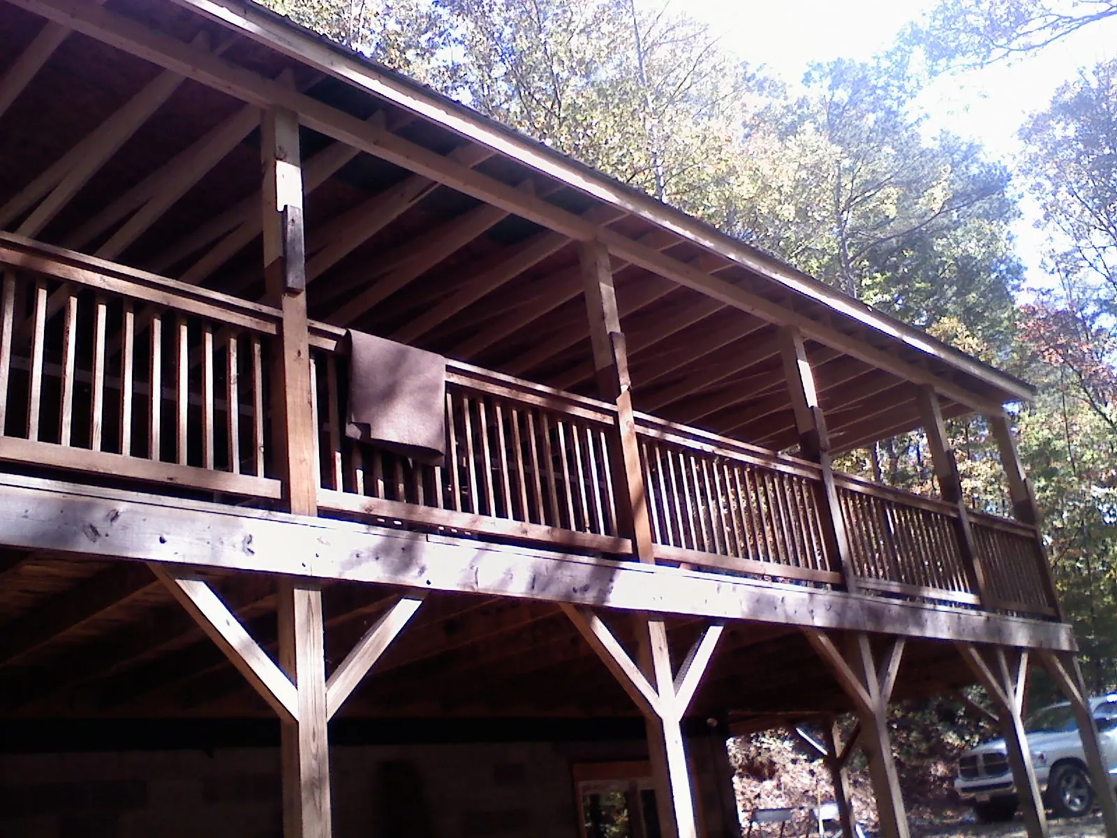 Timber framing under a new elevated porch and deck — Roof Leak Repair in Blakesburg by Roofing Brothers